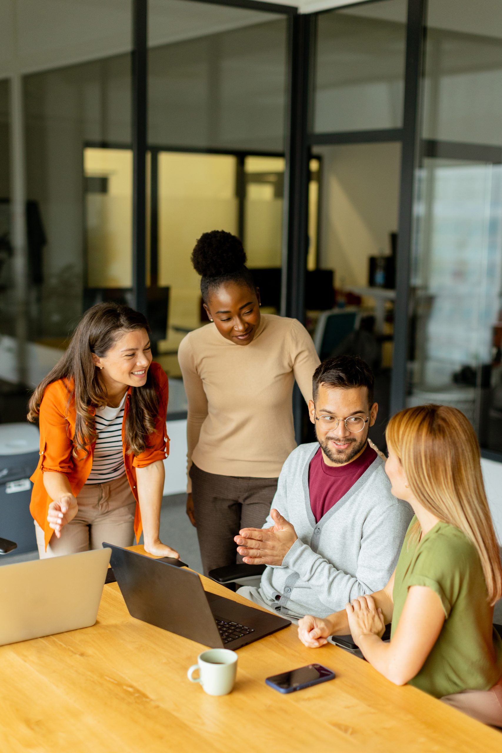 Young multiethnic startup team working in the modern office